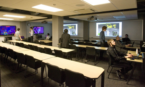Paul Fraughton  |   The Salt Lake Tribune
Students gather in Neumont University's game lab. The university offers bachelor's degrees in computer technology related fields.  The university is located at 143 S. Main St., in the remodeled Tribune Building.    Friday, June 28, 2013