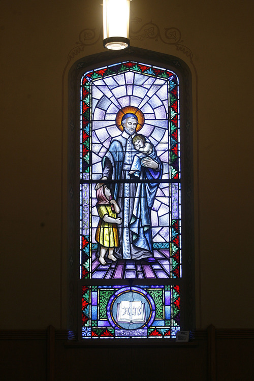 Scott Sommerdorf   |  The Salt Lake Tribune
Stained glass of St. Vincent de Paul, a 17th century Frenchman who founded two religious orders. The window is inside Our Lady of Lourdes Catholic Church in Salt Lake City.
