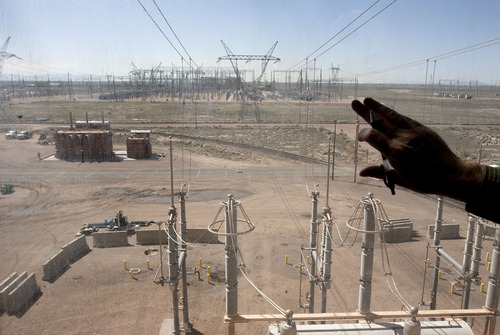 Steve Griffin | The Salt Lake Tribune

Power leaves the Intermountain Power Plant near Delta, Utah through an array of power lines Friday April 12, 2013.