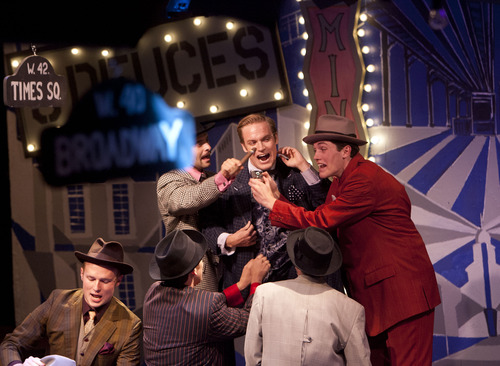 Steve Griffin | The Salt Lake Tribune


Carter Thompson, as Nathan Detroit, center, in the Hale Center Theater's production of "Guys and Dolls" in Orem, Utah Tuesday June 25, 2013.