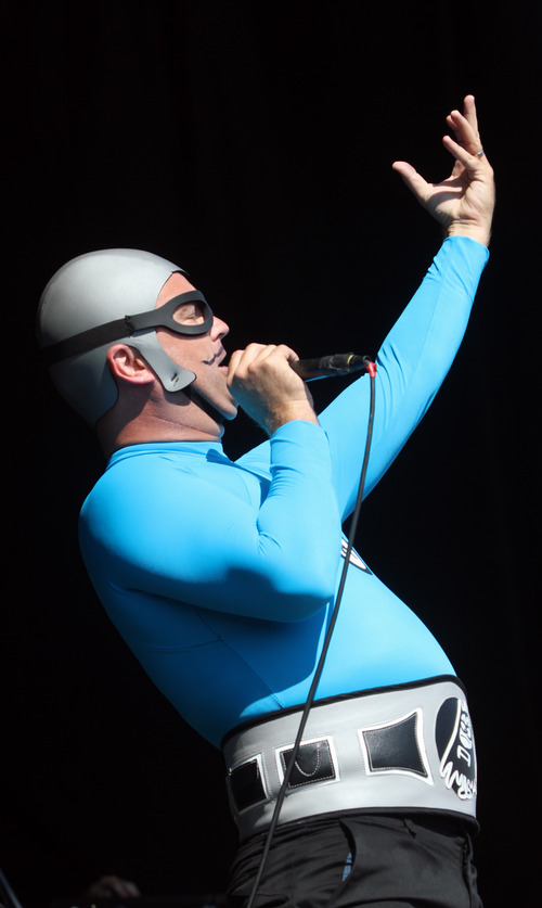 Rick Egan  | The Salt Lake Tribune 

MC Bat Commander sings for the Aquabats, at the Warped Tour, at the Utah State Fairgrounds, Saturday, June 29, 2013.