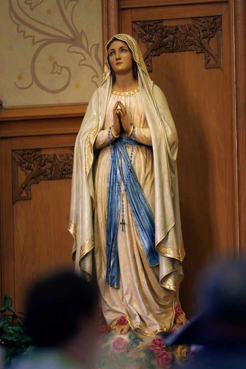 Scott Sommerdorf   |  The Salt Lake Tribune
Statue of Mary inside Our Lady of Lourdes Catholic Church. The church is celebrating its 100th anniversary. Sunday, June 23, 2013.