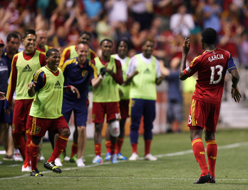 Kim Raff  |  The Salt Lake Tribune
(right) Real Salt Lake forward Olmes Garcia (13) dances in front of the Real Salt Lake sideline after scoring a goal against the Los Angeles Galaxy during the second half at Rio Tinto Stadium in Salt Lake City on June 8, 2013.  Real went on to win the game 3-1.
