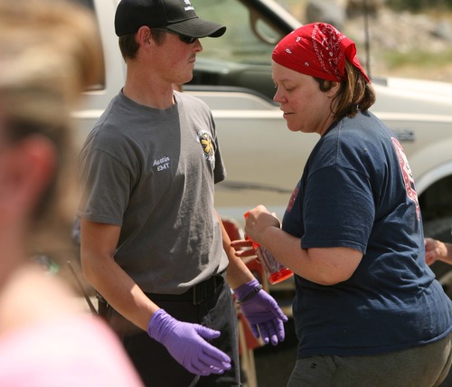 Leah Hogsten  |  The Salt Lake Tribune
Missing hiker Holly Cowsert, her daughter Mandy, 12, and husband David's two sons, Polo, 13, and Nate 12, of Perry, were rescued Wednesday, July 3, 2013 from a rugged Perry Canyon, where they spent the night after becoming lost.