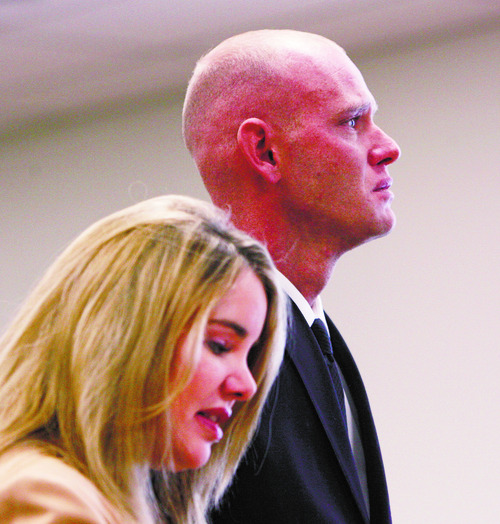 Steve Griffin | Tribune file photo
Eric Charlton, who pled guilty to accidentally fatally shooting his brother in the head during a camping trip, stands with his attorney Susanne Gustin, as he listens to the court during his sentencing hearing in 4th District Court in Nephi, Utah Thursday December 20, 2012.