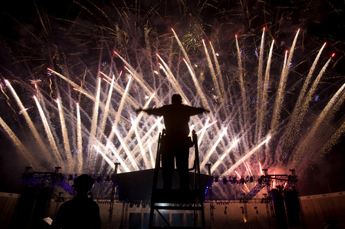 Kim Raff | The Salt Lake Tribune
A conductor for the Stadium of Fire Choir directs during the Stadium of Fire fireworks display at the LaVell Edwards Stadium in Provo on July 4, 2012.