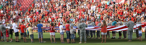 Steve Griffin | The Salt Lake Tribune


Utah National Guard members and their families hold a giant American Flag during the singing of the National Anthem before the RSL versus Philadelphia Union match at Rio Tinto Stadium. in Sandy, Utah Wednesday July 3, 2013.