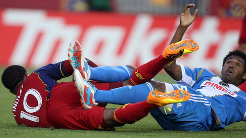 Steve Griffin | The Salt Lake Tribune


RSL'S Robbie Findley, left, crashes to the ground after getting tangled up with the Philadelphia Union's Sheanon Williams during match at Rio Tinto Stadium. in Sandy, Utah Wednesday July 3, 2013.