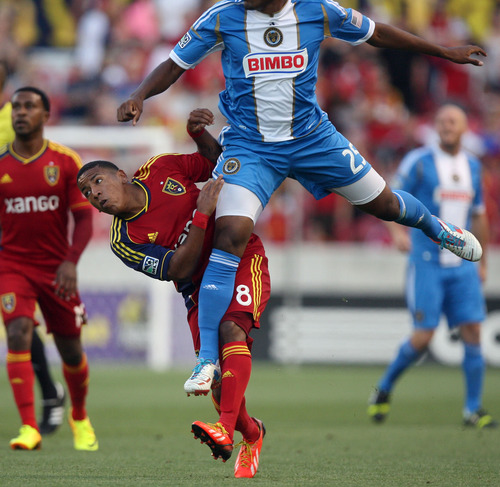 Steve Griffin | The Salt Lake Tribune


The Philadelphia Union's Sheanon Williams leaps over RSL'S Joao Plata as he heads the ball away during match at Rio Tinto Stadium. in Sandy, Utah Wednesday July 3, 2013.