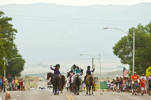 Chris Detrick  |  The Salt Lake Tribune
Sanpete County Cowboy Sweethearts ride their horses during the 4th of July parade in Moroni Thursday July 4, 2013.