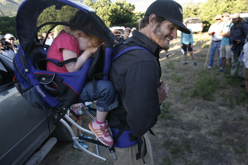 Scott Sommerdorf  |  The Salt Lake Tribune
Before leaving on the hike, Secretary of Interior Sally Jewell and the rest of the hikers sang happy birthday to 4-year-old Vena Fryer, who shyly hides her face behind her father, Greg Fryer, Saturday, June 29, 2013.