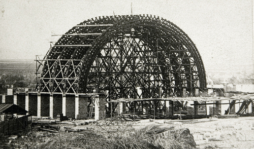 (Salt Lake Tribune archive)

Construction of the Salt Lake Tabernacle between 1864 and 1867. The roof of the Tabernacle was constructed in an Ithiel Town lattice-truss arch system that is held together by dowels and wedges. The building has a sandstone foundation, and the dome is supported by 44 sandstone piers. The overall seating capacity of the building is 7,000, which includes the choir area and gallery (balcony).