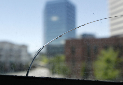 Al Hartmann  |  The Salt Lake Tribune
Cracked windows are common in the old Salt Lake Public Safety Building at 315 E. 200 South. The new building doesn't have any cracked windows, but does feature bullet-proof and blast-resistant glass.