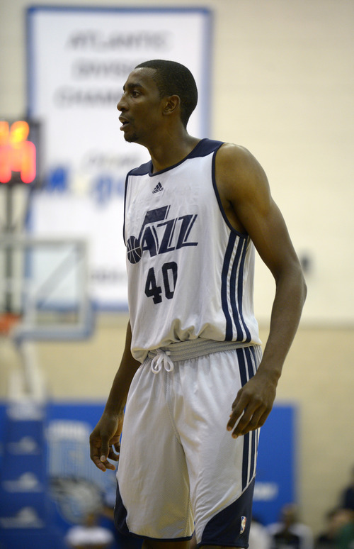 Utah Jazz forward Jeremy Evans gets set for a play during the second half of an NBA Orlando Pro Summer League game against the Miami Heat in Orlando, Fla., Sunday, July 7, 2013. (Special to the Tribune/Phelan M. Ebenhack)