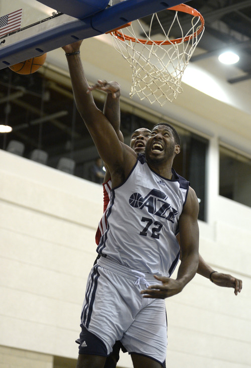 Utah Jazz forward James Mays (72) is fouled by Miami Heat center Jarvis Varnado, while going up for a shot, during the second half of an NBA Orlando Pro Summer League game in Orlando, Fla., Sunday, July 7, 2013. (Special to the Tribune/Phelan M. Ebenhack)