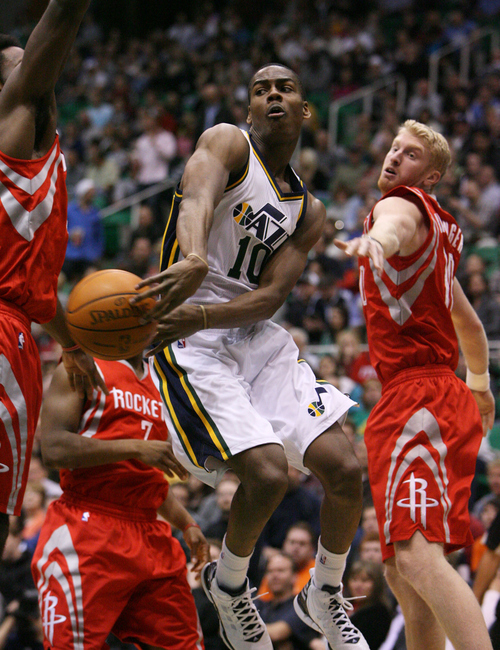 Steve Griffin  |  The Salt Lake Tribune

Utah's Alec Burks passes the ball through the Houston defense during first half action in the Jazz Rockets game at EnergySolutions Arena in Salt Lake City, Utah  Wednesday, February 29, 2012.