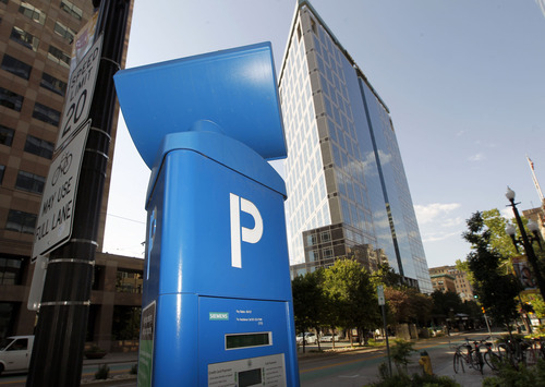 Al Hartmann  |  The Salt Lake Tribune
Parking meter pay station on Main Street in Salt Lake City Tuesday July 9.  Will it be the last day of free parking?  Salt Lake City's new, high-tech parking meters have been  offline for several days due to extreme heat.  The city has lost about $90,000.  They are planned to go online again Wednesday.