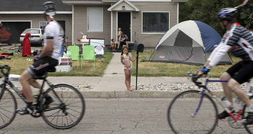 Keith Johnson | The Salt Lake Tribune

Sierra Hernandez tries to sell lemonade to passing cyclists in Lewiston, Utah during the MS 150 bike ride through Cache Valley, Utah June 29, 2013.