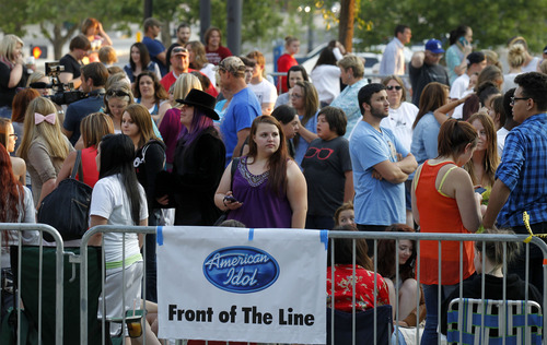 Al Hartmann  |  The Salt Lake Tribune
Hundred of people wait outside EnergySolutions Arena at 7 a.m. Wednesday July 10 to register to audition for "American Idol."  Auditions are Thursday, July 11.