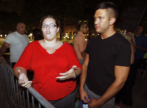 Al Hartmann  |  The Salt Lake Tribune
Stephanie Lewis of Orem and Aron James of Springville wait outside EnergySolutions Arena at 5 a.m. Wednesday July 10 to register to audition for "American Idol." They have auditioned before. Auditions are Thursday, July 11.