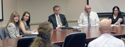 Al Hartmann  |  The Salt Lake Tribune
Salt Lake County Mayor Ben McAdams, center, meets with mental health advocates and patients over people being cut and discharged due to the latest Valley Mental Health cuts.