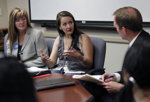 Al Hartmann  |  The Salt Lake Tribune
Mental health advocates Sarah Justice, left, and Ginger Phillips meet with Salt Lake County Mayor Ben McAdams over 2,000 people being cut and discharged from the latest Valley Mental Health cuts.