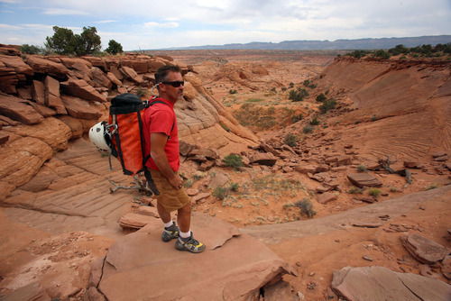 Francisco Kjolseth  |  The Salt Lake Tribune
Rick Green, owner of Excursions of the Escalante, surveys the landscape he calls home in the Grand Staircase-Escalante National Monument, taking customers down slot canyons and also playing a central role helping local authorities when it comes to rescuing those who get into problems in such a remote place.