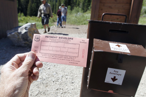 Al Hartmann  |  The Salt Lake Tribune
Fee envelopes and a drop box at the Timpooneke Trailhead parking lot in American Fork Canyon greet hikers before hitting the trail. The U.S. Forest Service is overhauling its recreational fee program for American Fork Canyon and Mirror Lake Scenic Byway. Instead of charging everyone who drives into these areas, the Forest Service proposes charging only those who use the recreational amenities.