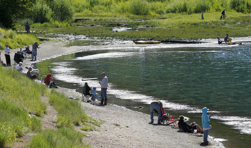 Al Hartmann  |  The Salt Lake Tribune
By mid-morning Friday June 21, 2013, the shoreline of Tibble Fork Reservoir in American Fork Canyon is getting crowded. The U.S. Forest Service is overhauling its recreational fee program for American Fork Canyon and Mirror Lake Scenic Byway. Instead of charging everyone who drives into these areas, the Forest Service proposes charging only those who use the recreational amenities.