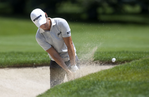 Steve Griffin | The Salt Lake Tribune


Dae-Hyun Kim blasts from the bunker on the 1st hole during the Utah Championship golf tournament at Willow Creek Country Club in Sandy, Utah Friday July 12, 2013.
