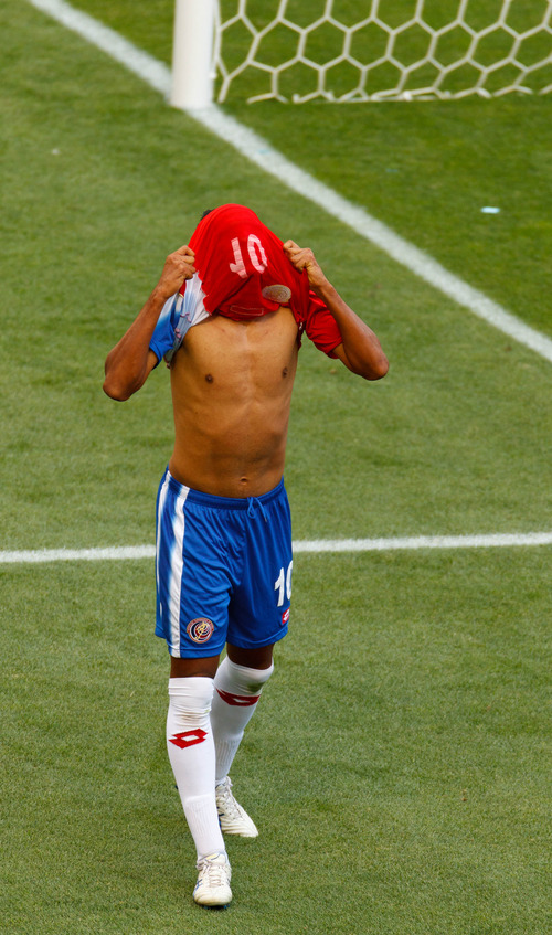 Trent Nelson  |  The Salt Lake Tribune
Costa Rica's Osvaldo Rodriguez pulls his jersey over his face after nearly scoring a goal as the Costa Rica defeats Belize 1-0 in CONCACAF Gold Cup soccer at Rio Tinto Stadium in Sandy, Saturday July 13, 2013.