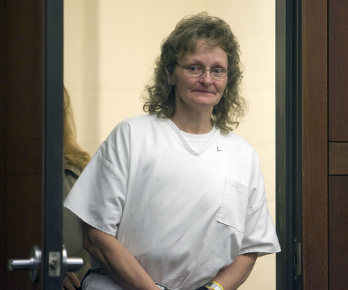Al Hartmann  |  The Salt Lake Tribune 
POOL PHOTO
Debra Brown enters Judge Michael DiReda's 2nd District Court in Ogden Tuesday January 18th.  She is the first Utah inmate to try a new state law that allows for non DNA innocence claims.