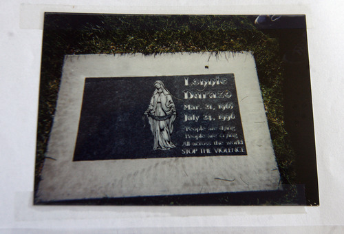 Scott Sommerdorf   |  The Salt Lake Tribune
A copy of a Durazo family photo of Lonnie Durazo's gravesite in Salt Lake City, Friday, July 12, 2013.