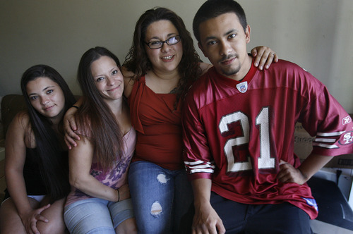Scott Sommerdorf   |  The Salt Lake Tribune
From left to right, Derinda, Cherrise, Larisa and Isaac Durazo photographed in their home in West Valley City, Friday, July 12, 2013.