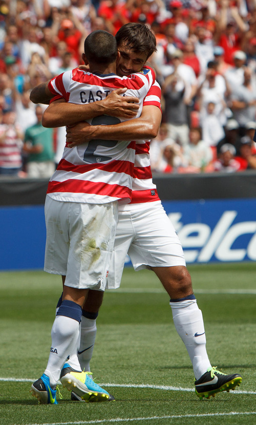Trent Nelson  |  The Salt Lake Tribune
USA's Chris Wondolowski celebrates a second half goal with teammate Edgar Castillo as the United States faces Cuba in CONCACAF Gold Cup soccer at Rio Tinto Stadium in Sandy, Saturday July 13, 2013.