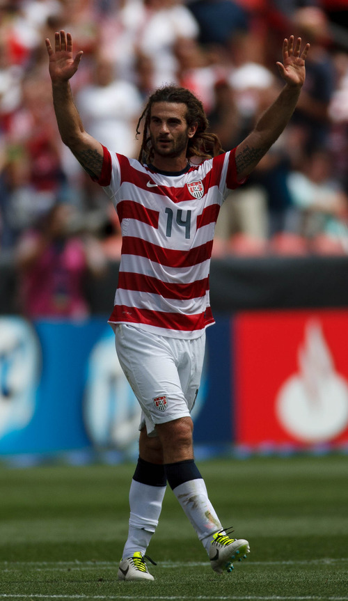 Trent Nelson  |  The Salt Lake Tribune
USA's Kyle Beckerman acknowledges the crowd as the United States faces Cuba in CONCACAF Gold Cup soccer at Rio Tinto Stadium in Sandy, Saturday July 13, 2013.
