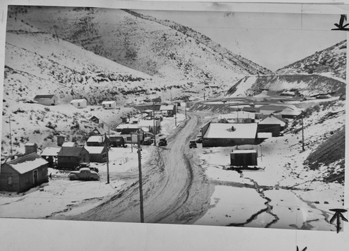 Salt Lake Tribune archive

The town of Mercur, Utah first came into being in 1870 as Lewiston, when gold was discovered at the head of the Lewiston Canyon. A small gold rush began, peaking about 1873. The population reached as high as 2000. Lewiston became a ghost town by 1880 when the ore ran out. In 1890 the gold rush started all over again, and a new town sprang to life on the old site, but the name of Lewiston was already taken by then, so the citizens settled on the name Mercur, In 1902 a fire that started in the business district of the town burned almost the entire city to the ground. The town was rebuilt and mining resumed again. In its heyday, there were about 5,000 residents of Mercur. By 1913 all the mines were closed and by 1916 there was only one building left in Mercur. Mercur supported a large Italian immigrant community. Young men were attracted by the opportunity of high wages and the romance of the American "wild west." With this Italian influence, Columbus Day became an important city event including parades, games and performances by the Mercur City Band.