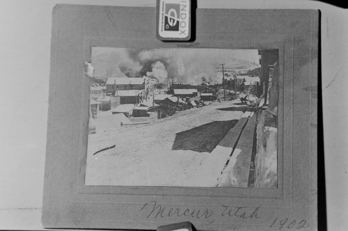 Salt Lake Tribune archive

An explosion in Mercur in 1902. The town of Mercur, Utah first came into being in 1870 as Lewiston, when gold was discovered at the head of the Lewiston Canyon. A small gold rush began, peaking about 1873. The population reached as high as 2000. Lewiston became a ghost town by 1880 when the ore ran out. In 1890 the gold rush started all over again, and a new town sprang to life on the old site, but the name of Lewiston was already taken by then, so the citizens settled on the name Mercur, In 1902 a fire that started in the business district of the town burned almost the entire city to the ground. The town was rebuilt and mining resumed again. In its heyday, there were about 5,000 residents of Mercur. By 1913 all the mines were closed and by 1916 there was only one building left in Mercur. Mercur supported a large Italian immigrant community. Young men were attracted by the opportunity of high wages and the romance of the American "wild west." With this Italian influence, Columbus Day became an important city event including parades, games and performances by the Mercur City Band.