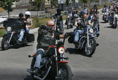 Scott Sommerdorf  |  The Salt Lake Tribune
Tyler Decapot, foreground, leads a group of riders on a motorcycle ride to raise donations for 2-year-old Derek Fugal of Springville, who is battling kidney cancer. The ride went from Black Ball Performance in Lindon to Legends Motorcycle in Springville, Sunday, July 14, 2013.