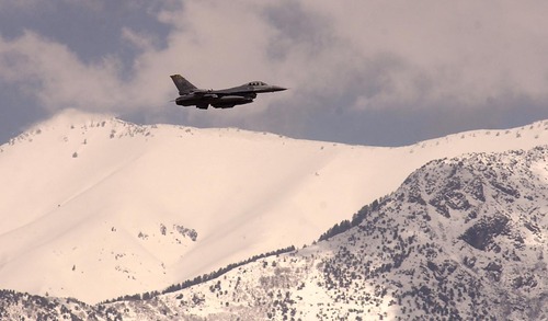 Tribune file photo
An F-16 takes off from Hill Air Force Base. The 388th's 4th Fighter Squadron is preparing to resume training flights after being grounded since April due to funding cuts.