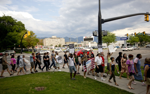 Lennie Mahler  |  The Salt Lake Tribune
Protesters march around the Matheson Courthouse to honor Trayvon Martin and condemn the verdict which found George Zimmerman not guilty of murder. Salt Lake City, Utah. Monday, July 15, 2013.