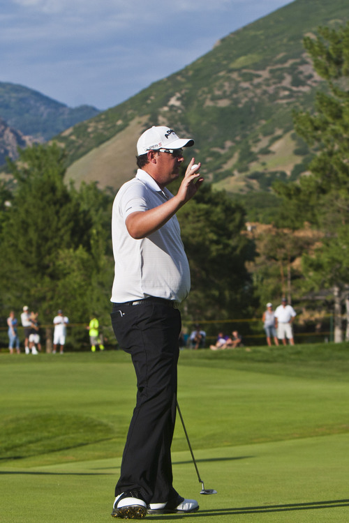 Chris Detrick  |  The Salt Lake Tribune
Ashley Hall acknowledges the crowd on the 18th hole during the Web.com Tour's Utah Championship at Willow Creek Country Club Sunday July 14, 2013. Steven Alker won the championship.