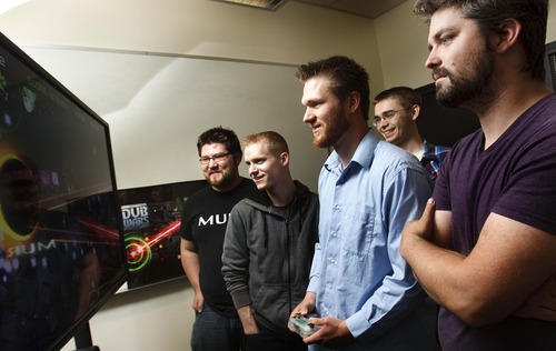 Leah Hogsten  |  The Salt Lake Tribune
Evan Phillips, left, Ben Hale, Joe Albrethsen, Michael Chugg and Sam Sawyer from Utah Valley University have made a video game that is now a part of the new Ouya Video Game console. The game "DubWars" is played to dubstep music.