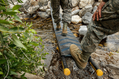 Trent Nelson  |  The Salt Lake Tribune
US Air Force ROTC cadets cross a creek as engineering students from Utah State University demonstrated their winning design for a mobile bridge for use by the military, Tuesday July 16, 2013 in Logan Canyon.