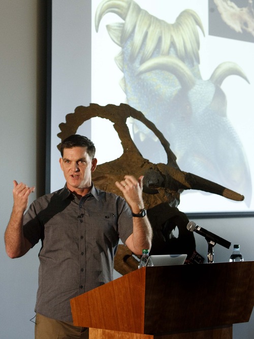 Leah Hogsten  |  The Salt Lake Tribune
Scott Sampson, vice president of research and collections at the Denver Museum of Nature & Science, gives details about the appearance and habitat of Nasutoceratops. The newly named dinosaur, Nasutoceratops titusi, was unveiled by paleontologists from the Natural History Museum of Utah, the Bureau of Land Management and the Denver Museum of Nature & Science at Utah's Natural History Museum Wednesday, July 17, 2013. It was discovered in 2006 in the Grand Staircase-Escalante National Monument.