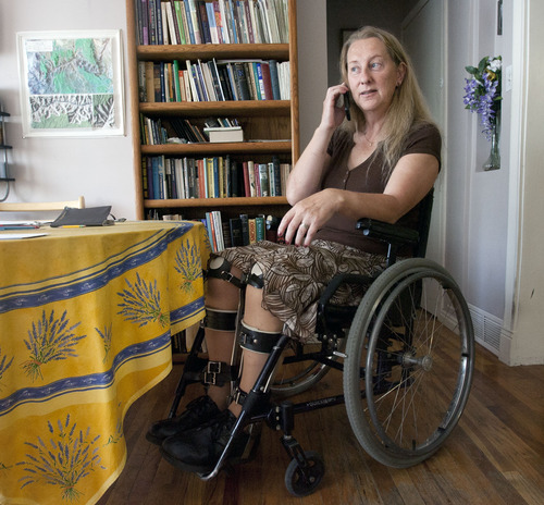 Steve Griffin | The Salt Lake Tribune

Chloe Jennings-White listens to her voice messages from her West Bountiful home Friday July 19, 2013. Jennings-White has a neurological condition called body integrity identity disorder (BIID) in which she feels she would be more comfortable paralyzed.
