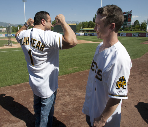 Steve Griffin | The Salt Lake Tribune


Marty York, who played Yeah Yeah in the movie "Sandlot," flexes his muscles as he points to his name on the back of his Bees jersey, as follow actor Victor DiMattia, who played Timmy Timmons, wears his Bees jersey, as members of the movie cast meet current Bees players following batting practice at SpringMobile Ballpark in Salt Lake City, Utah Friday July 19, 2013. Cast members from the movie were at the ball park celebrating the anniversary of the classic baseball film.