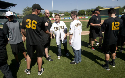 Steve Griffin | The Salt Lake Tribune

 
Patrick Renna, who played Ham Porter,  and Victor DiMattia, who played Timmy Timmons, in the movie "Sandlot," shake hands with Bees players following batting practice at SpringMobile Ballpark in Salt Lake City, Utah Friday July 19, 2013. Cast members from the movie were at the ball park celebrating the anniversary of the classic baseball film.