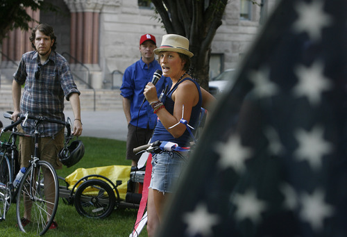 Scott Sommerdorf   |  The Salt Lake Tribune
Heidi Goedhart gives the riders the word that they will be leaving on their July ride with the theme "MERICA" in Salt Lake City, Saturday, July 13, 2013.