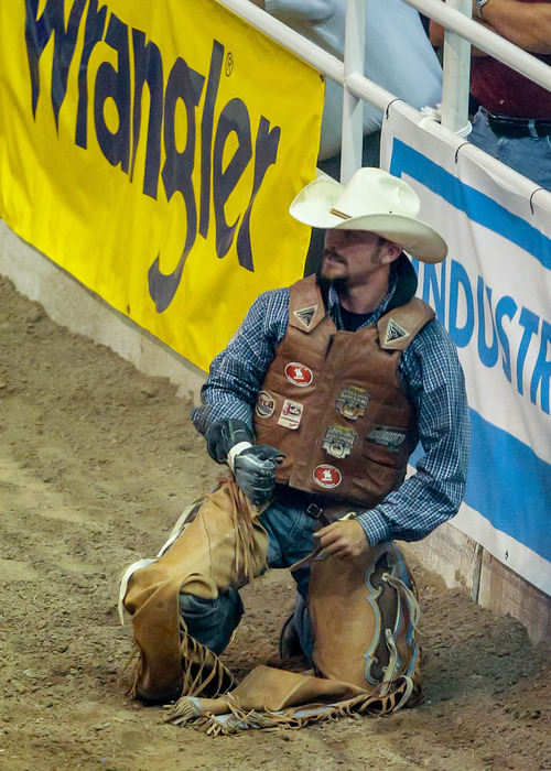 Trent Nelson  |  The Salt Lake Tribune
Winn Ratliff competing in Championship Bareback Riding at the Days of '47 Rodeo at EnergySolutions Arena in Salt Lake City Saturday July 20, 2013.